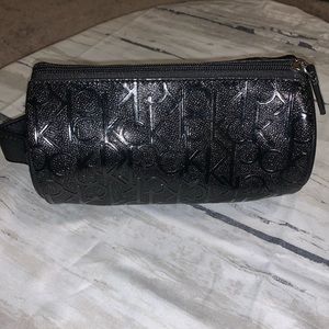Calvin Klein cosmetic case.